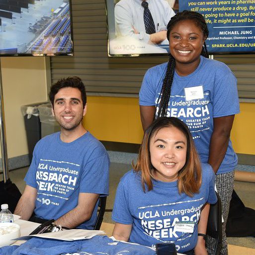 Four UCLA student volunteers at Undergraduate Research Week