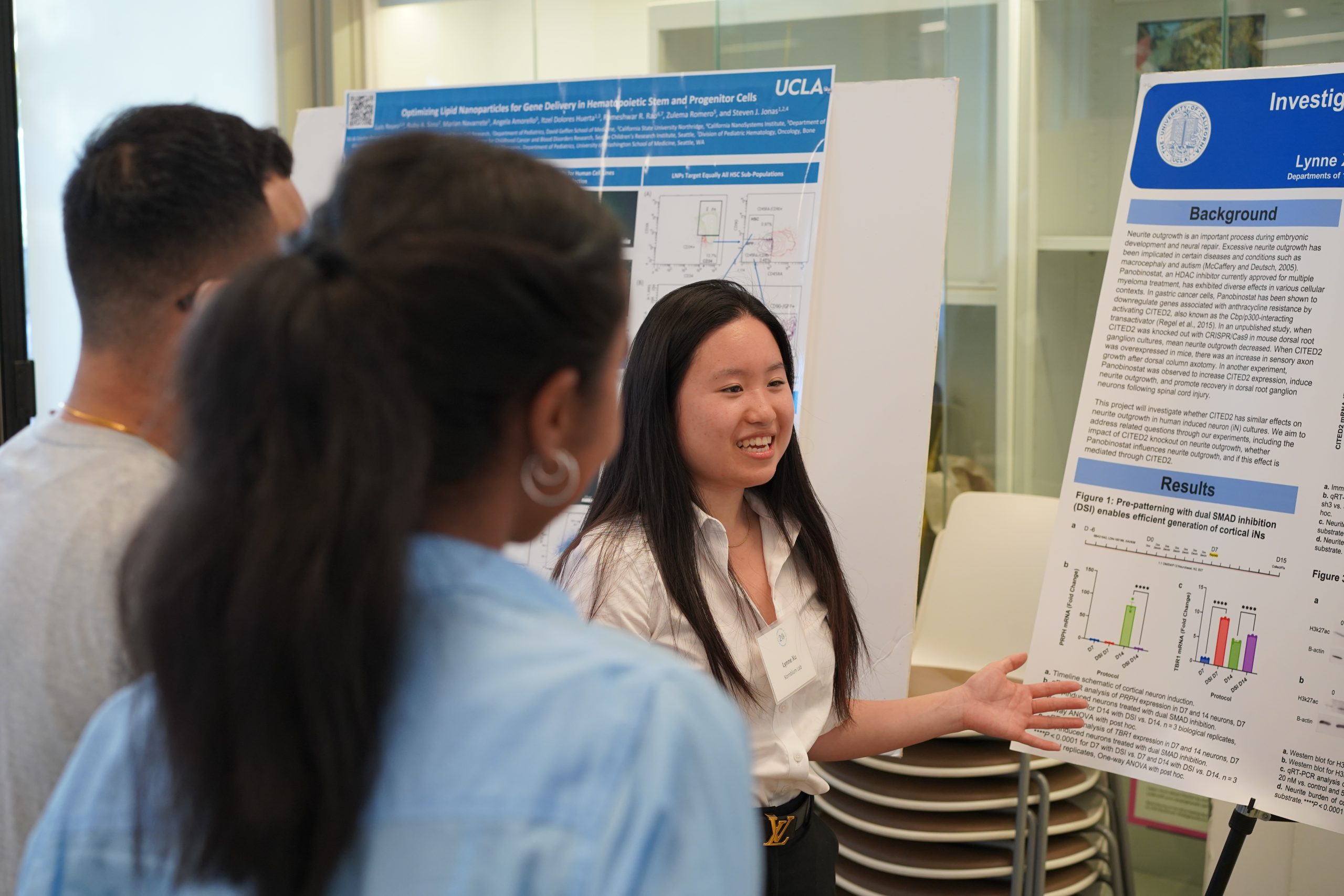UCLA students presenting research poster
